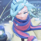 A screenshot of Grusha from Pokémon Scarlet & Violet, in the middle of terrastilizing his Pokémon.